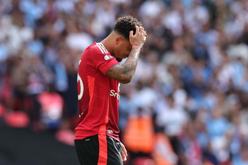 Jadon Sancho of Manchester United looks dejected after missing his team's fourth penalty in the penalty shoot-out during the 2024 FA Community Shie...