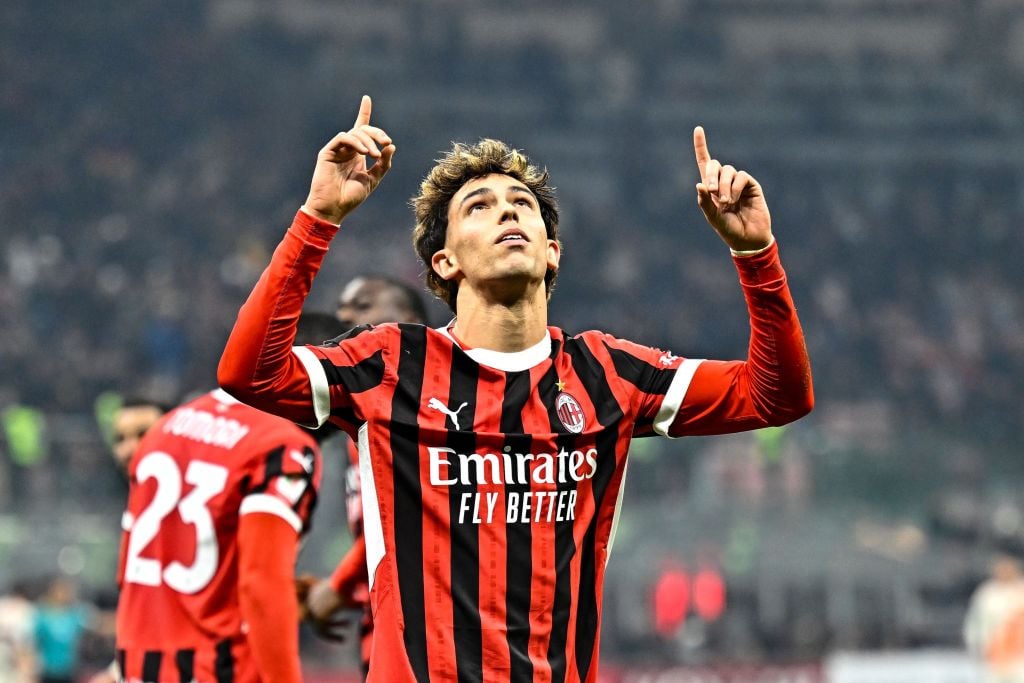 João Félix celebrates after scoring the 3-1 goal during the Coppa Italia Quarter Final match between AC Milan and AS Roma at Stadio Giuseppe Meazza...