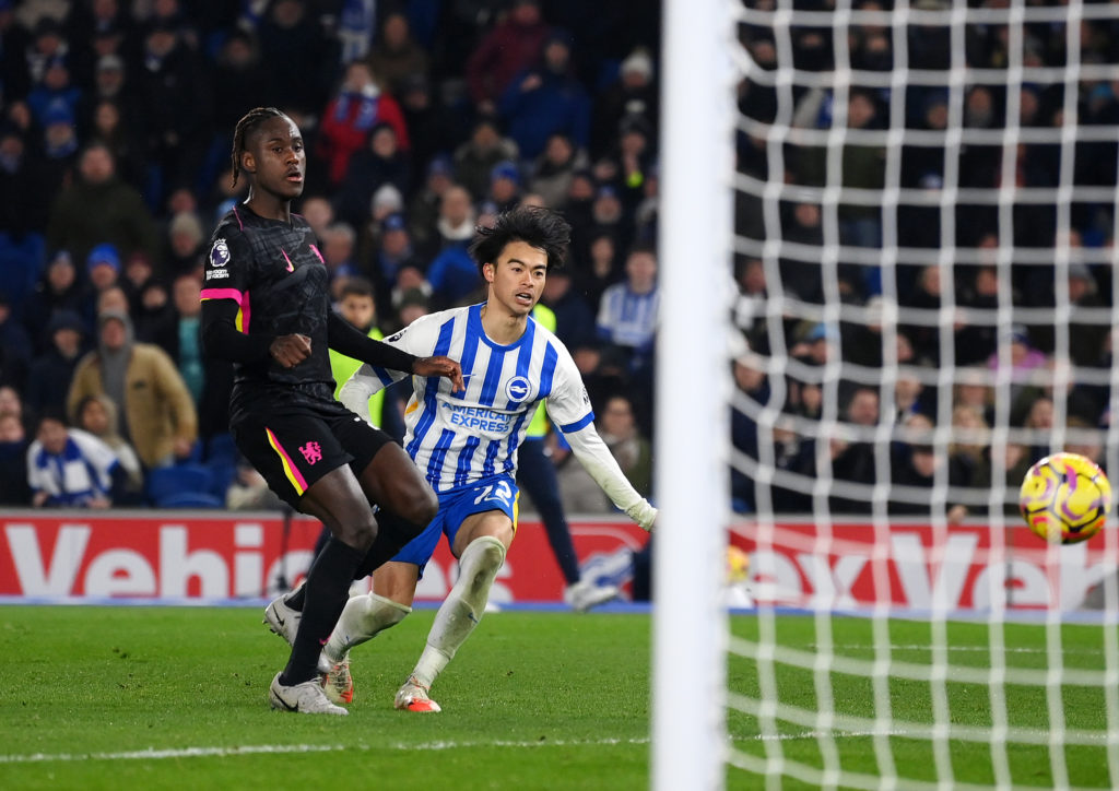 Kaoru Mitoma of Brighton & Hove Albion has a shot saved by Filip Jorgensen of Chelsea (not pictured) during the Premier League match between Br...