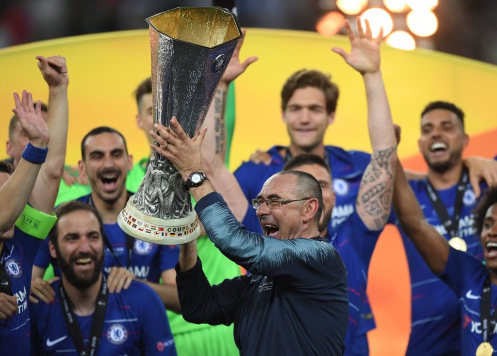 Maurizio Sarri hoisting the Europa League trophy with Chelsea