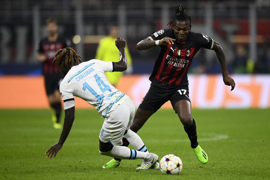 Rafael Leao (R) of AC Milan is challenged by Trevoh Chalobah