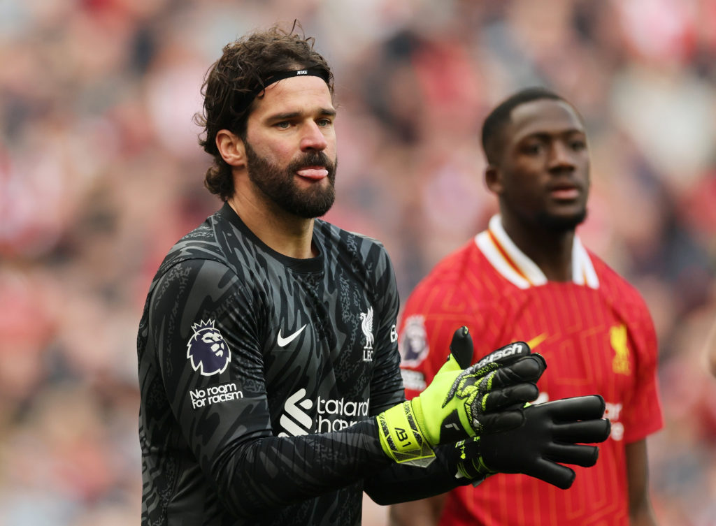 Alisson Becker of Liverpool reacts prior to the Premier League match between Liverpool FC and Southampton FC