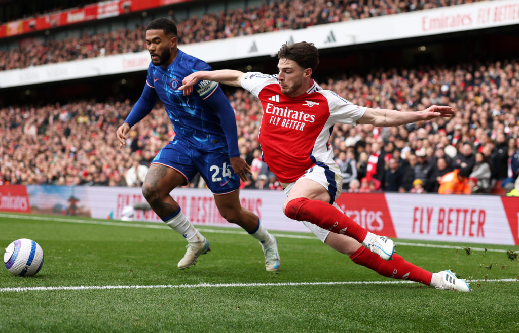 Chelsea's Reece James and Arsenal's Declan Rice compete for the ball.