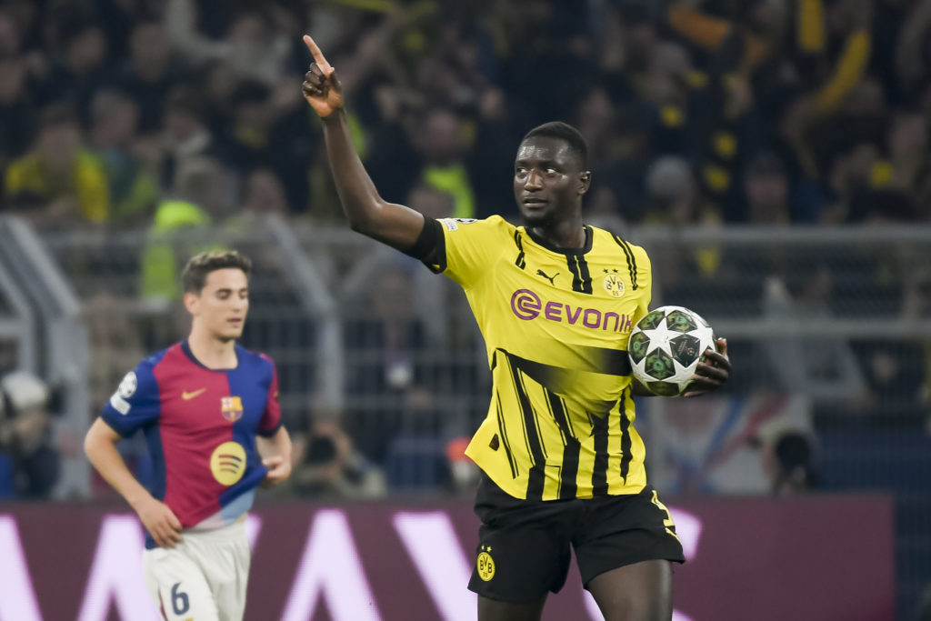 Serhou Guirassy celebrates a goal for Borussia Dortmund.