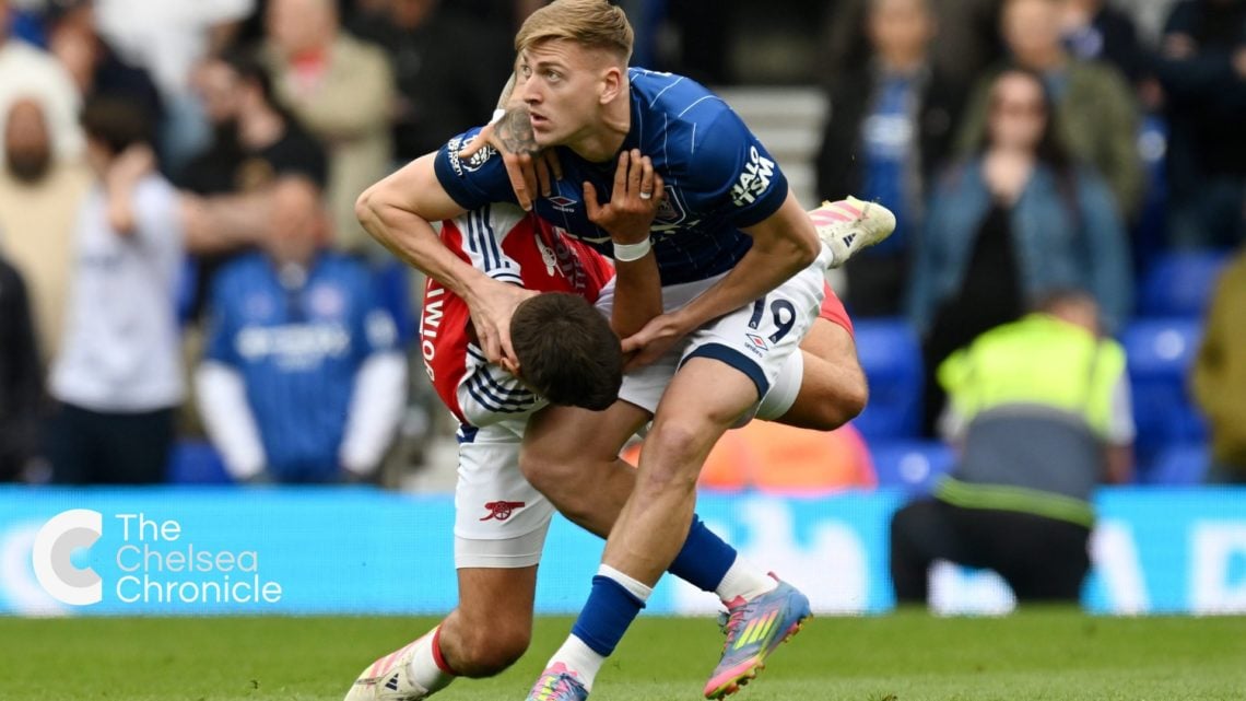 Ipswich Town striker Liam Delap wrestling with Arsenal player