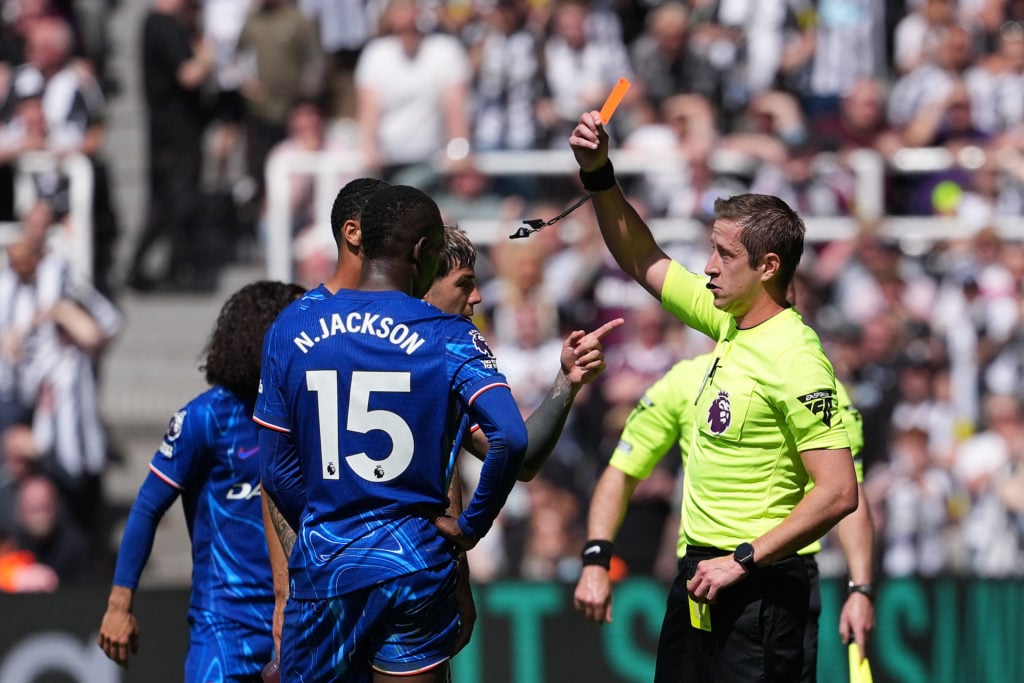Nicolas Jackson is shown a red card during Newcastle vs Chelsea