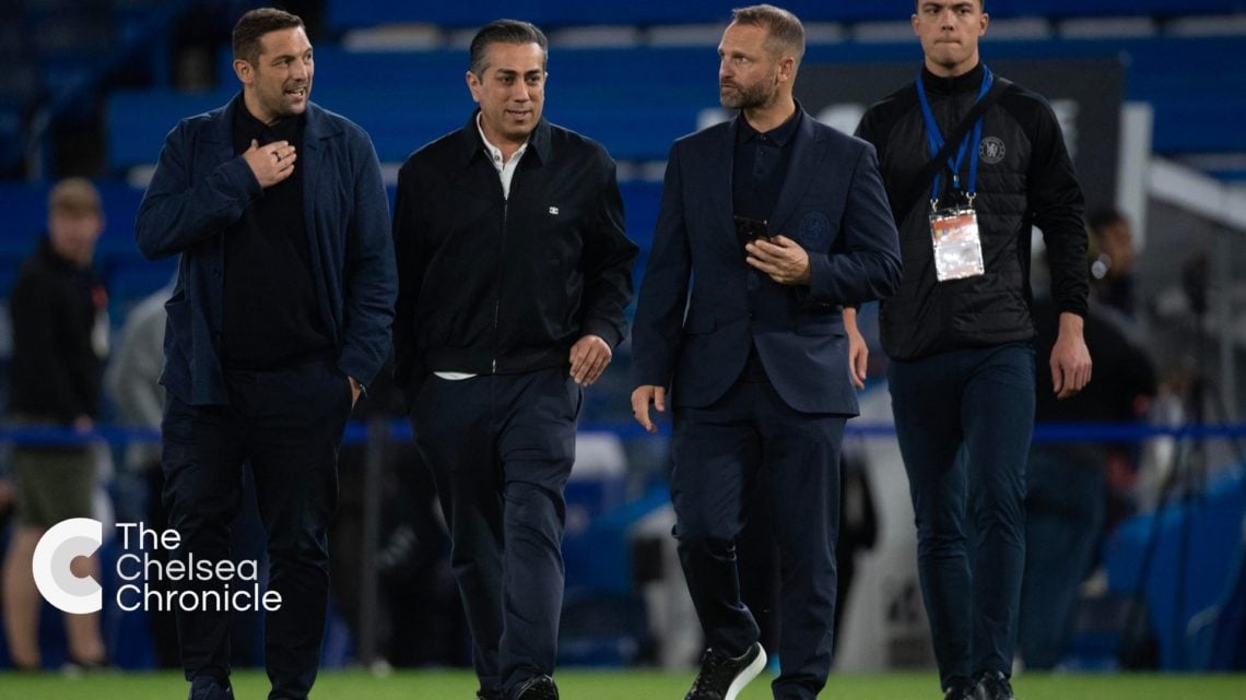 Chelsea owner Behdad Eghbali and directors Laurence Stewart and Paul Winstanley on pitch