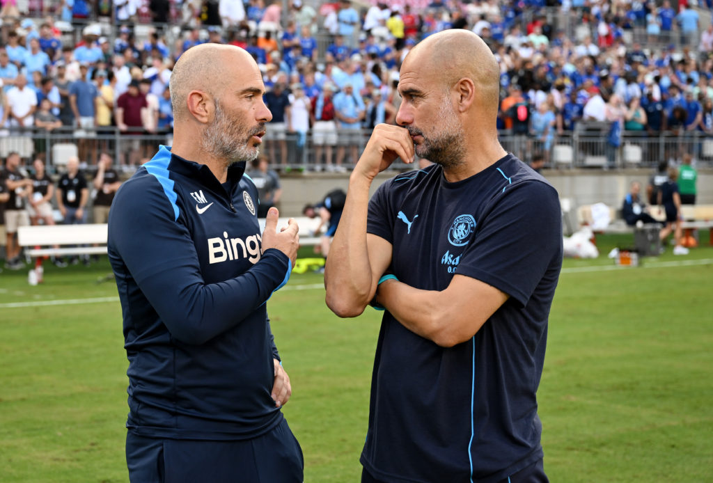 Enzo Maresca and Pep Guardiola in conversation ahead of Chelsea FC v Manchester City - Pre-Season Friendly