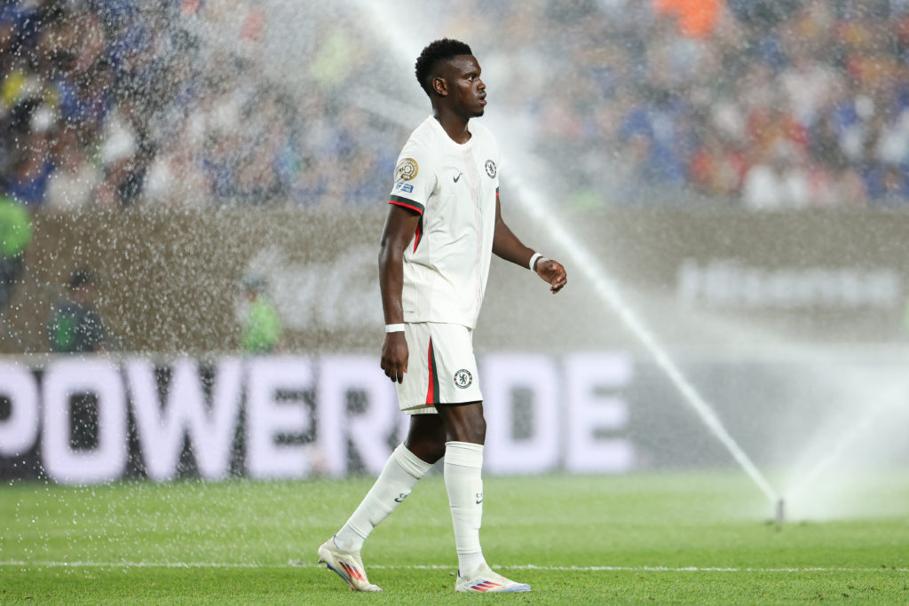 Benoit Badiashile walks past sprinklers during Esperance de Tunis v Chelsea FC: Group D - FIFA Club World Cup 2025