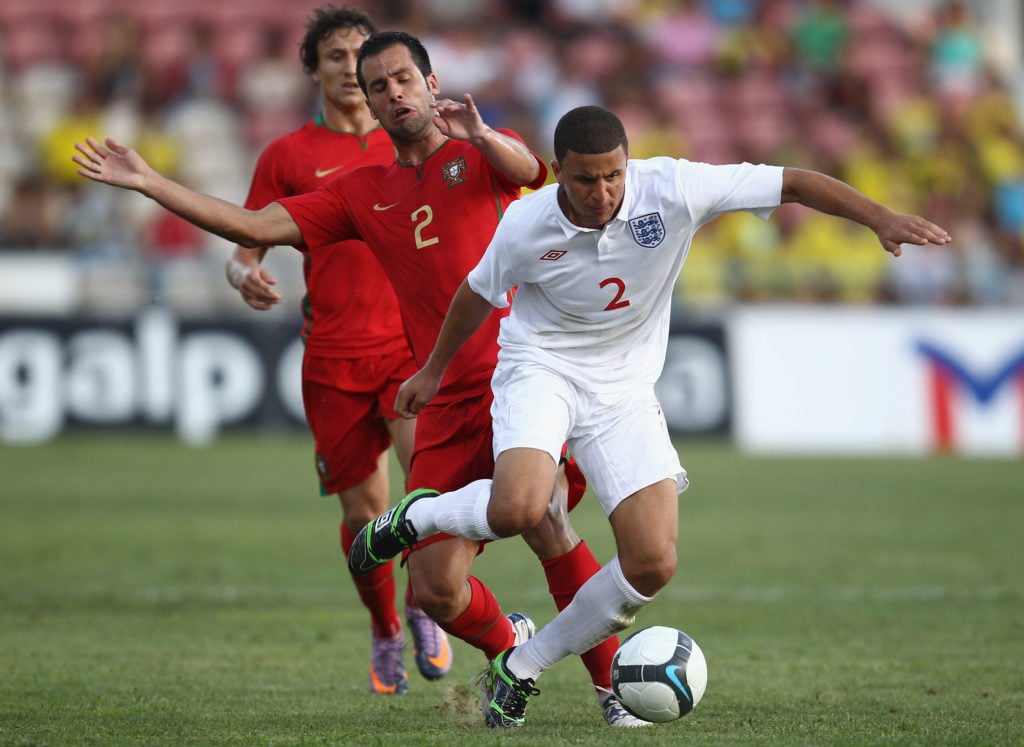 Kyle Walker of England battles for the ball with Fabio Faria of Portugal