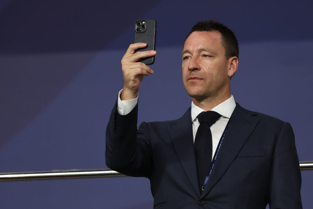 John Terry takes a photo during Chelsea v Palmeiras: Final - FIFA Club World Cup UAE 2021