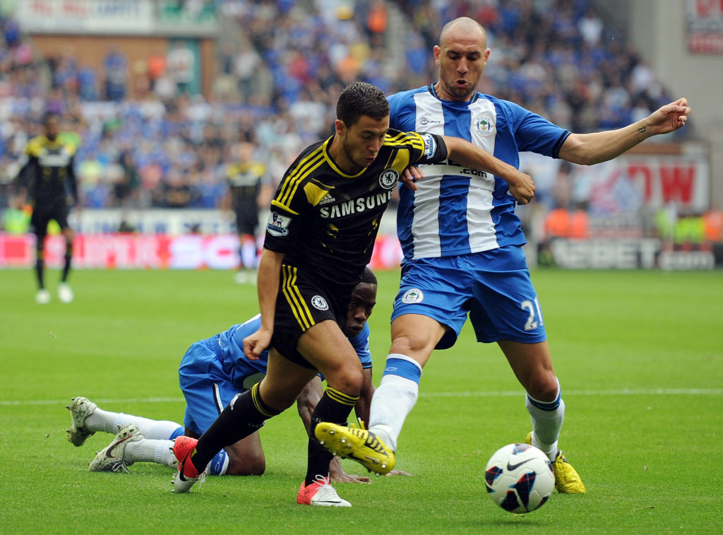 Eden Hazard being fouled on his Chelsea debut against Wigan Athletic in the Premier League.