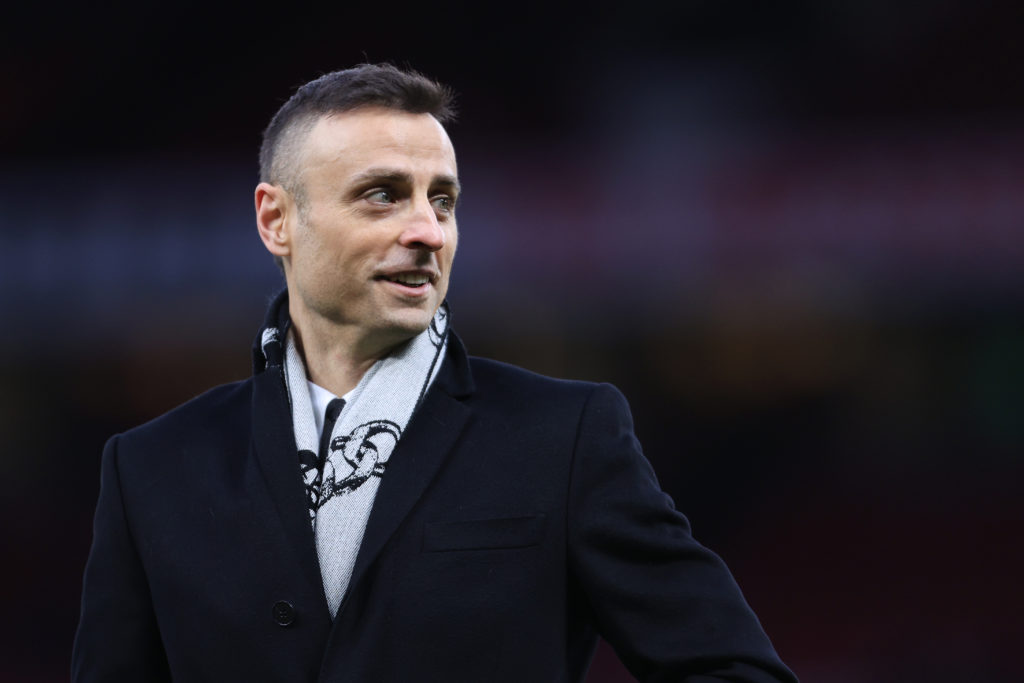 Former striker Dimitar Berbatov looks on before the Premier League match between Manchester United and Tottenham.