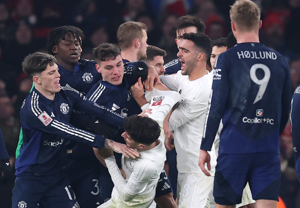 Alejandro Garnacho of Manchester United clashes with Kai Havertz of Arsenal