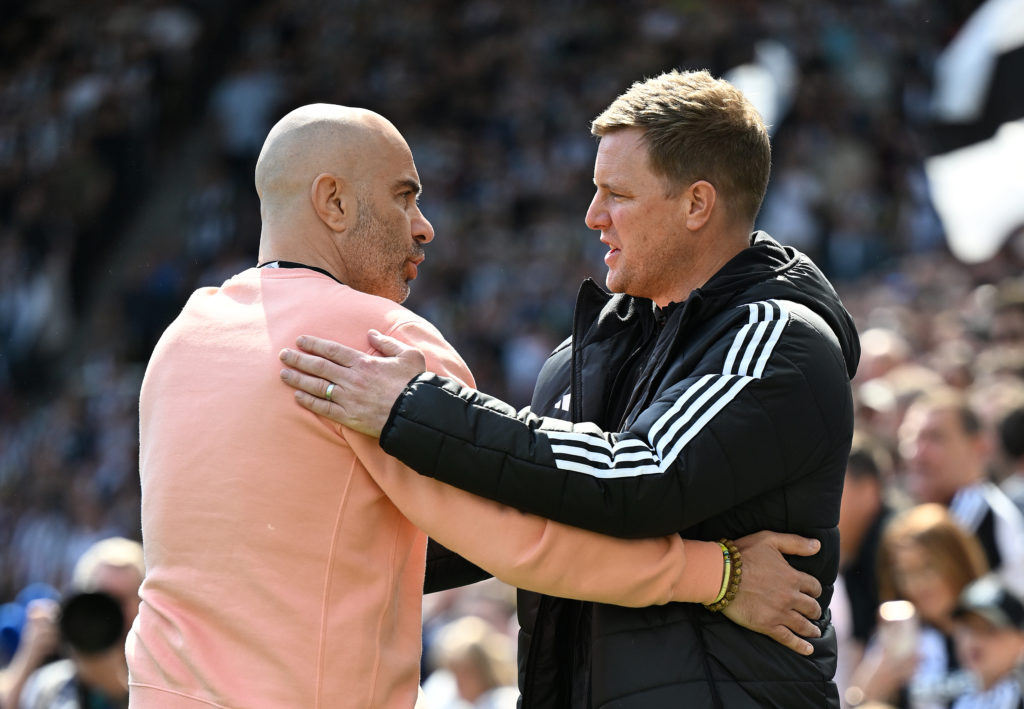 Chelsea manager Enzo Maresca and Newcastle United manager Eddie Howe embrace before a Premier League match.