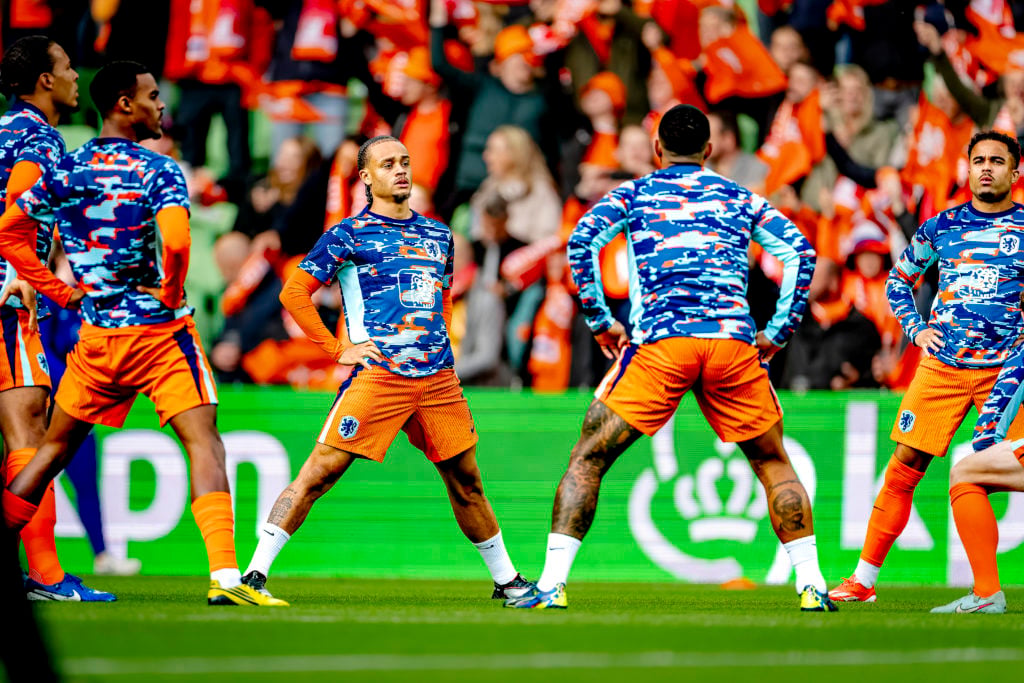 Xavi Simons warming up for the Netherlands ahead of the World Cup qualifier against Malta.