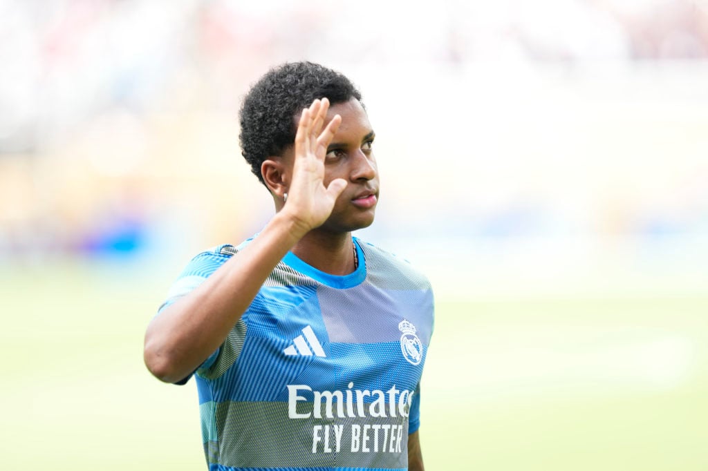 Real Madrid forward Rodrygo waving during warm up