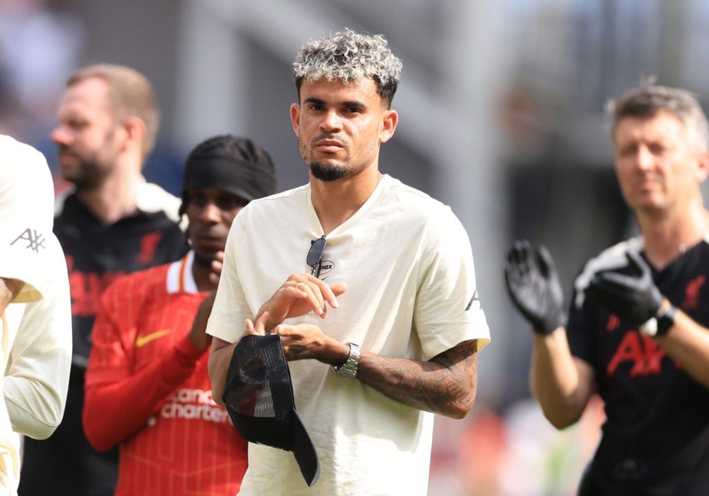 Luis Diaz of Liverpool applauds the fans