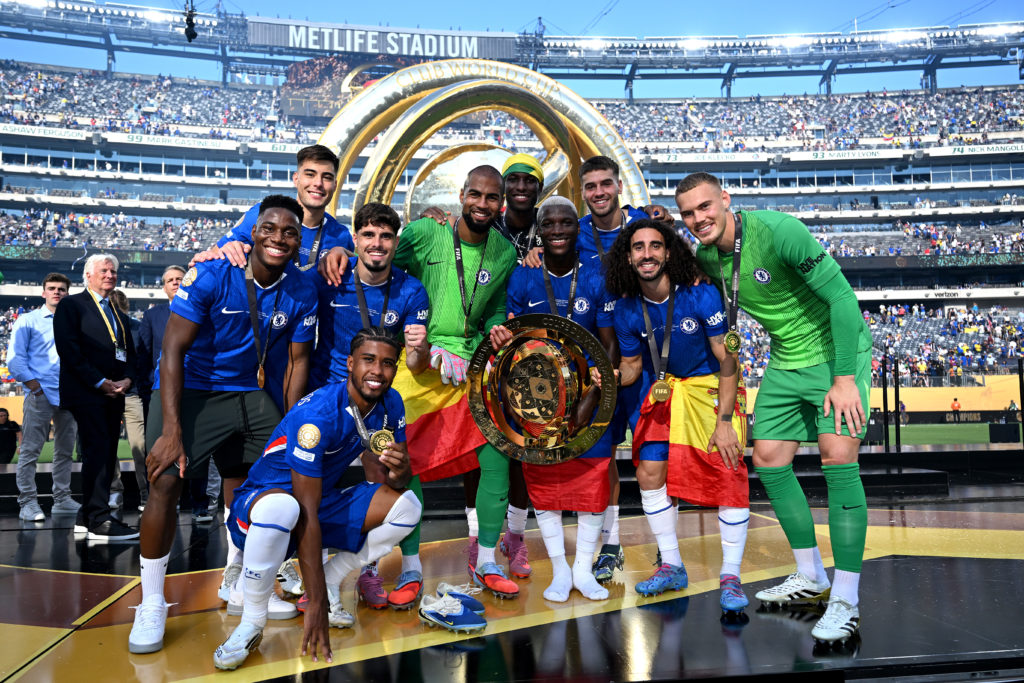 Chelsea players pose for a photo with the trophy after Chelsea FC v Paris Saint-Germain: Final - FIFA Club World Cup 2025