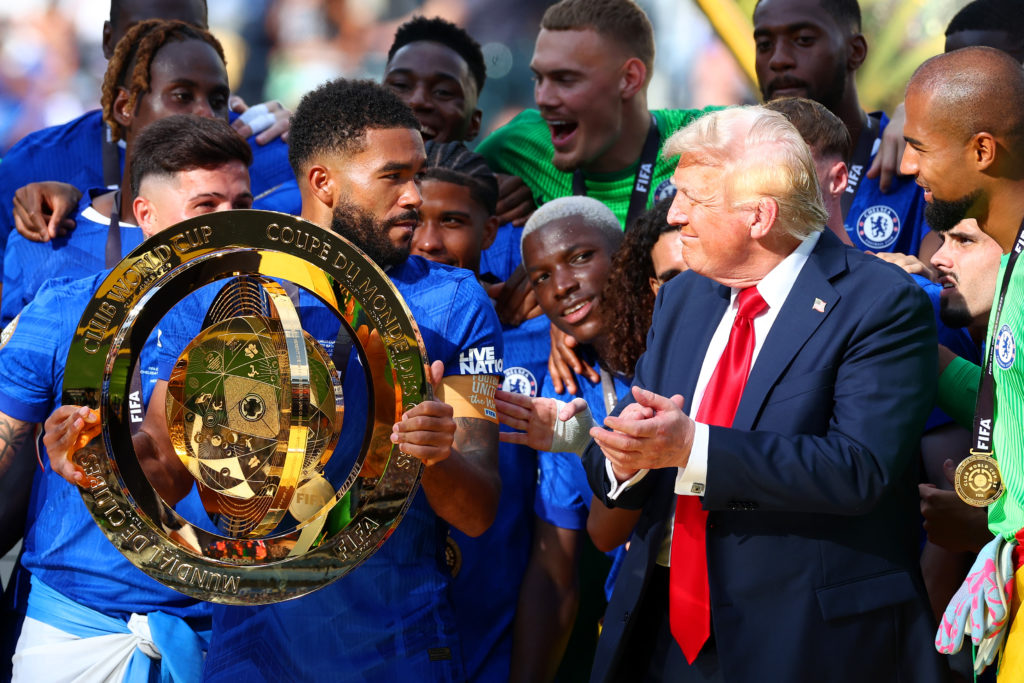 Reece James of Chelsea looks towards U.S President Donald Trump as he prepares to lift trophy