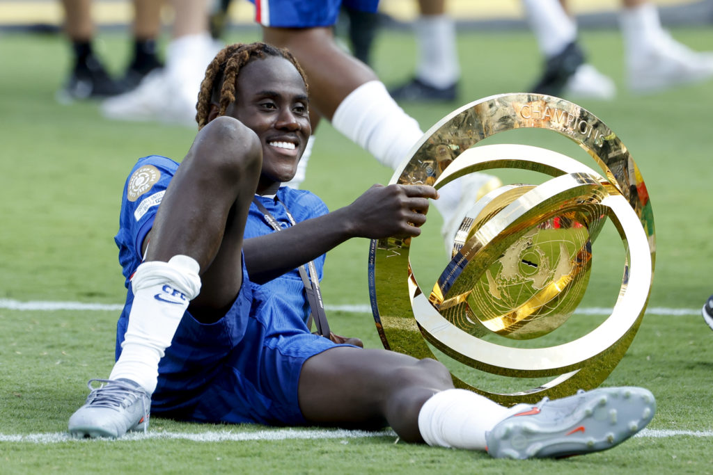 Trevoh Chalobah poses with the trophy after Chelsea FC v Paris Saint-Germain: Final - FIFA Club World Cup 2025