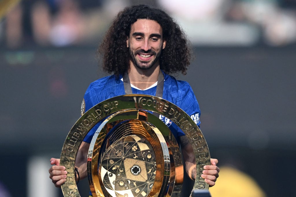 Marc Cucurella poses with the trophy after Chelsea FC v Paris Saint-Germain: Final - FIFA Club World Cup 2025