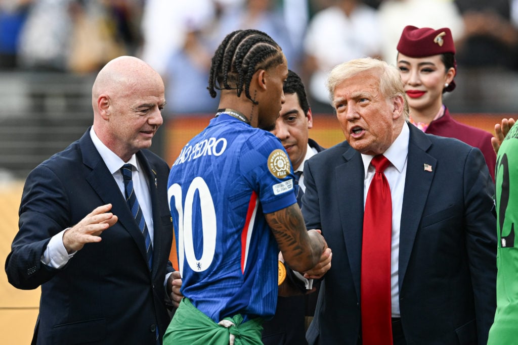 Joao Pedro is awarded winner's medal by Donald Trump after Chelsea FC v Paris Saint-Germain: Final - FIFA Club World Cup 2025