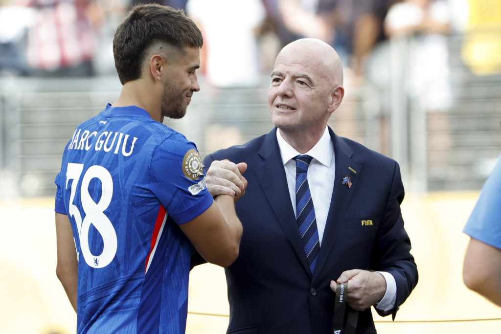 Marc Guiu is congratulated by Gianni Infantino after Chelsea FC v Paris Saint-Germain: Final - FIFA Club World Cup 2025