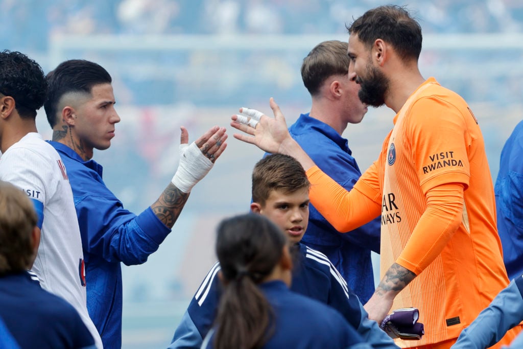 Enzo Fernandez and Gianluigi Donnarumma shake handes before Chelsea FC v Paris Saint-Germain: Final - FIFA Club World Cup 2025