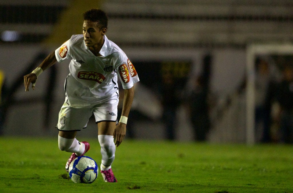 Neymar dribbles the ball for Santos ar Neymar in action for Santos during the Vasco V Santos, Futebol Brasileirao League match in 2010.