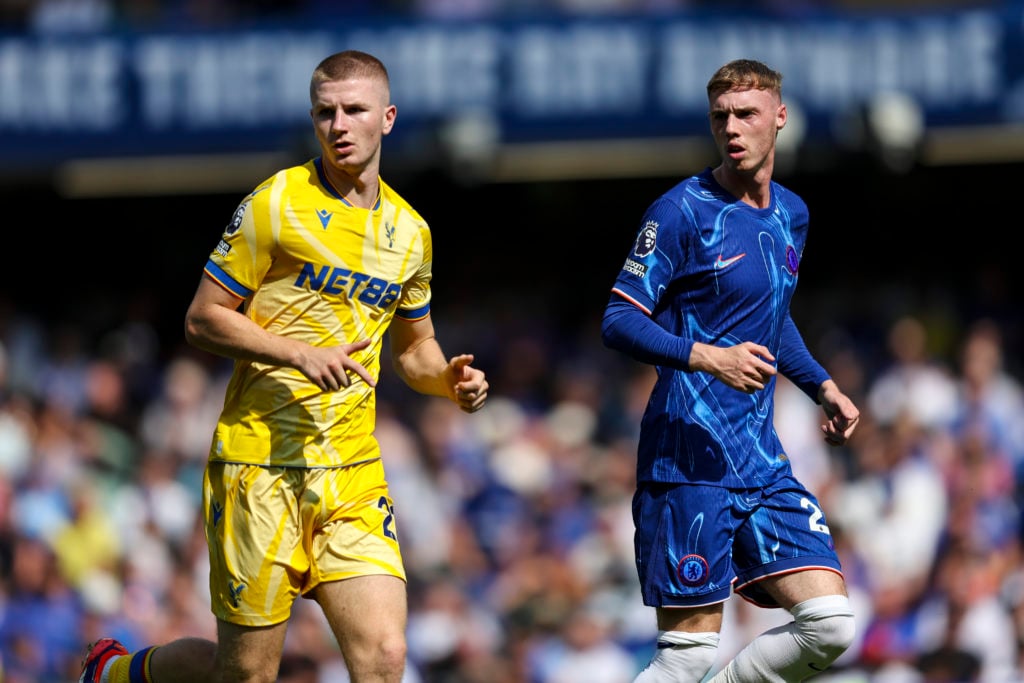 Chelsea's Cole Palmer and Crystal Palace's Adam Wharton during a Premier League match.