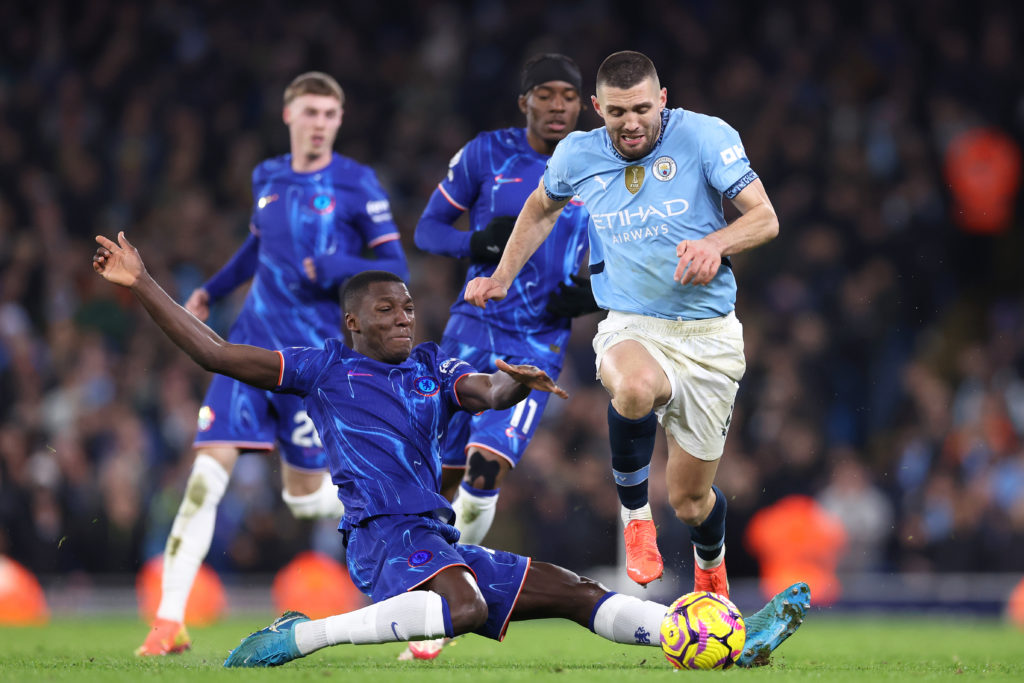 Moises Caicedo challenges Mateo Kovacic during Manchester City FC v Chelsea FC - Premier League