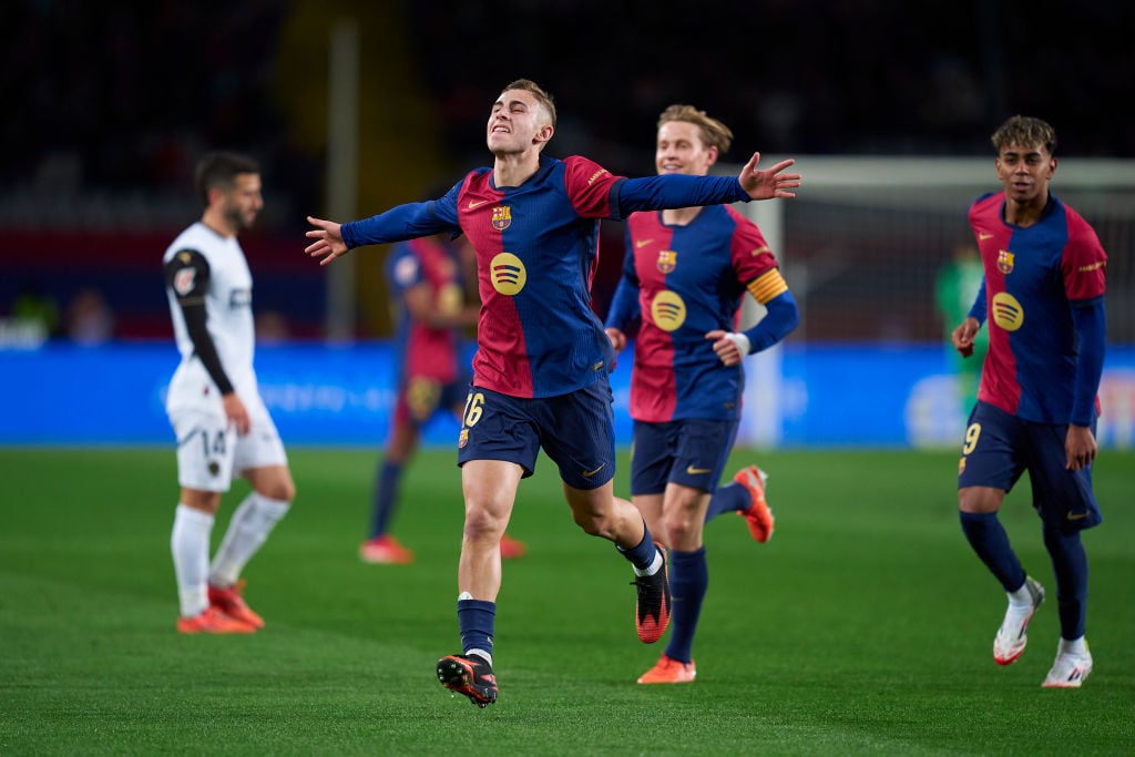 Fermin Lopez celebrates scoring for Barcelona against Valencia in a La Liga match.