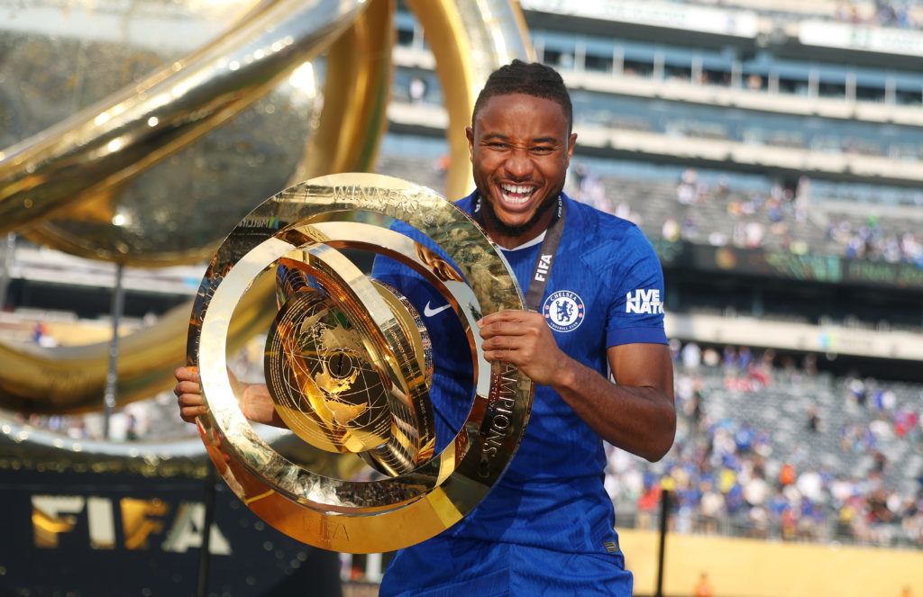 Christopher Nkunku poses with the trophy after Chelsea FC v Paris Saint-Germain: Final - FIFA Club World Cup 2025