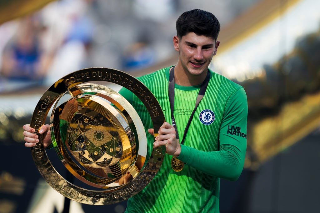 Mike Penders of Chelsea FC poses with the trophy during the award ceremony following the FIFA Club World Cup final