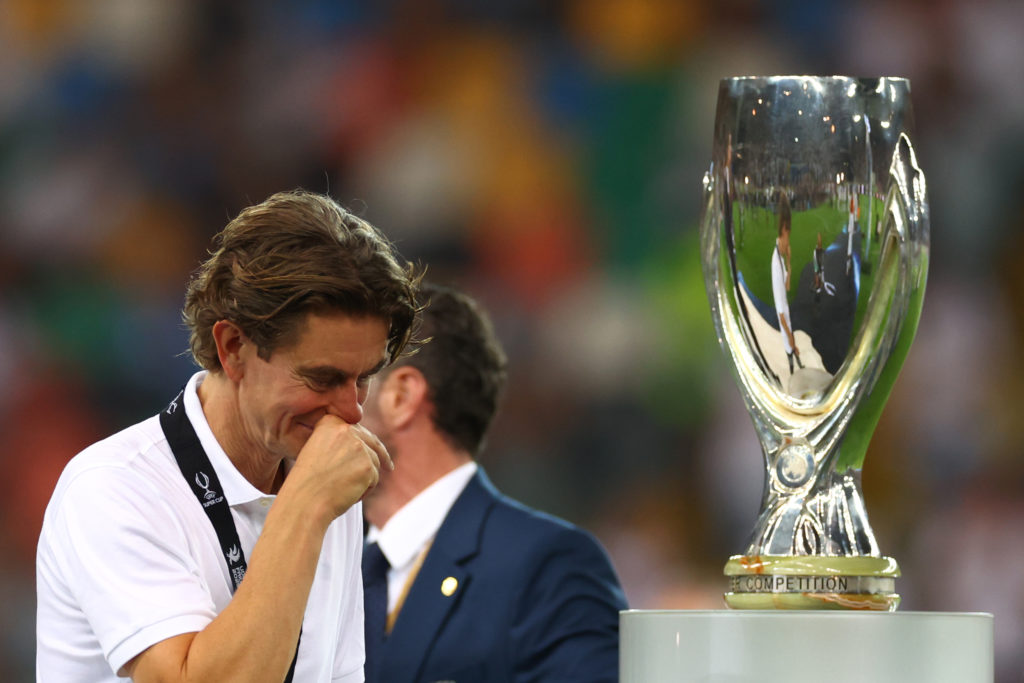 Thomas Frank walks past the trophy after Paris Saint-Germain v Tottenham Hotspur - UEFA Super Cup 2025