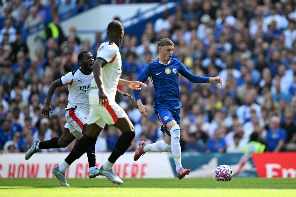 Cole Palmer dribbling for Chelsea against AC Milan in a pre-season friendly.