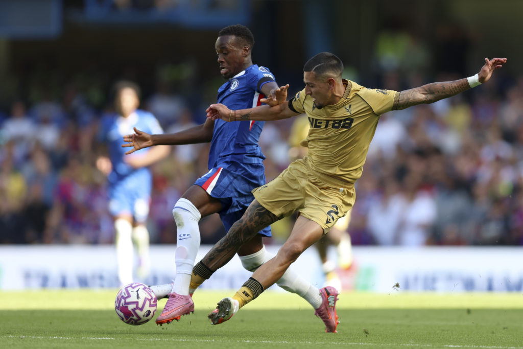 Jamie Gittens and Daniel Munoz challenge during Chelsea v Crystal Palace - Premier League