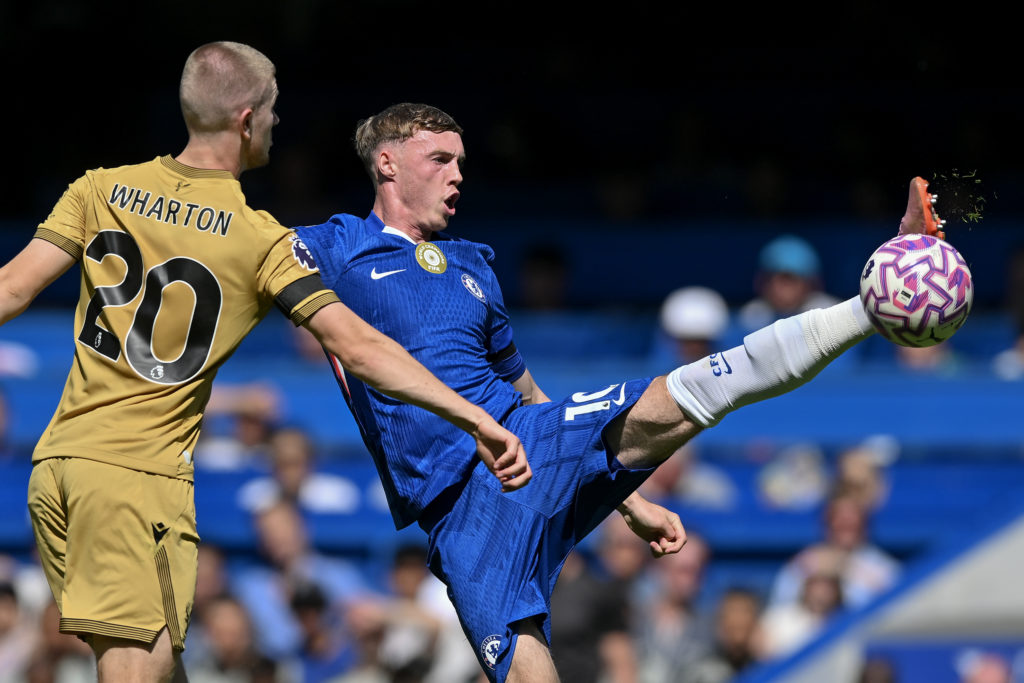 Chelsea's Cole Palmer battles with Crystal Palace's Adam Wharton during the Premier League match.