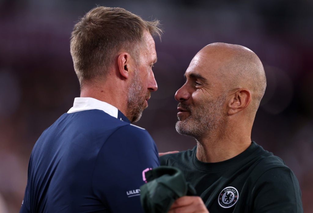 West Ham manager Graham Potter and Chelsea manager Enzo Maresca interact during the Premier League match between the two sides.