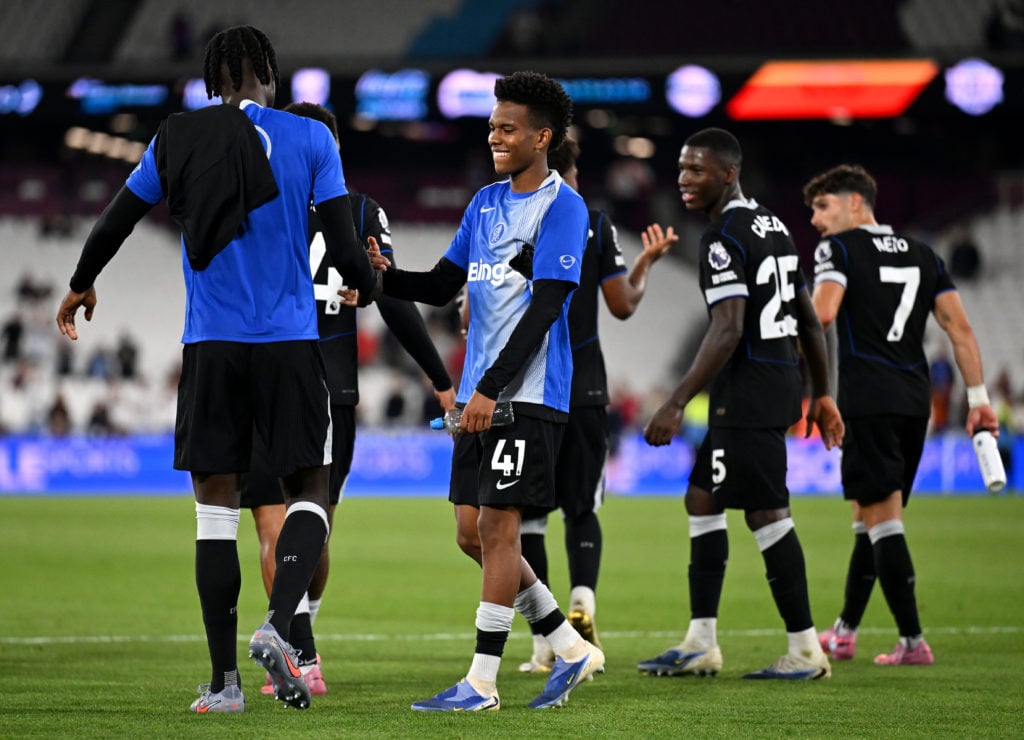 Trevoh Chalobah embraces Chelsea teammate Estevao Willian after the Premier League win against West Ham.