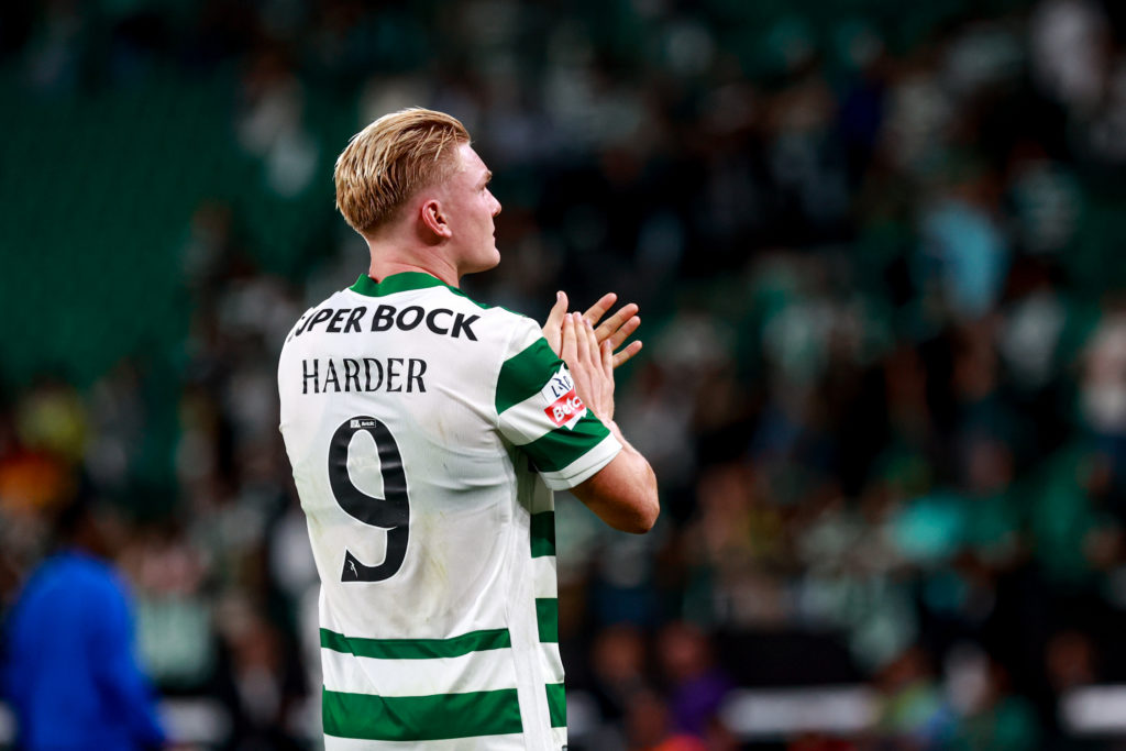 Conrad Harder forward of Sporting clapping