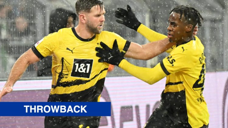 Niclas Fullkrug and Jamie Gittens celebrate a goal for Borussia Dortmund against Borussia Monchengladbach in the German Bundesliga.