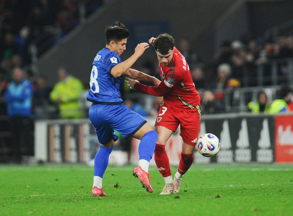 Dastan Satpaev playing for Kazakhstan against Wales in a World Cup qualifier.