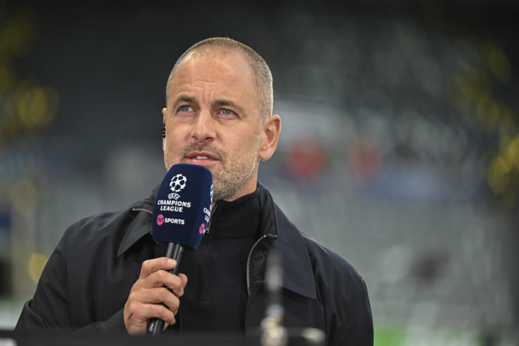 Chelsea legend Joe Cole holding TNT Sports microphone