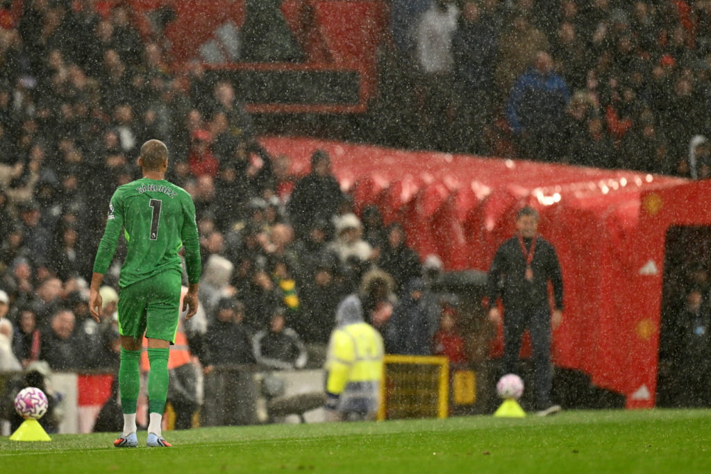 Chelsea goalkeeper Robert Sanchez walks back to the changing room after being sent off against Manchester United in the Premier League.
