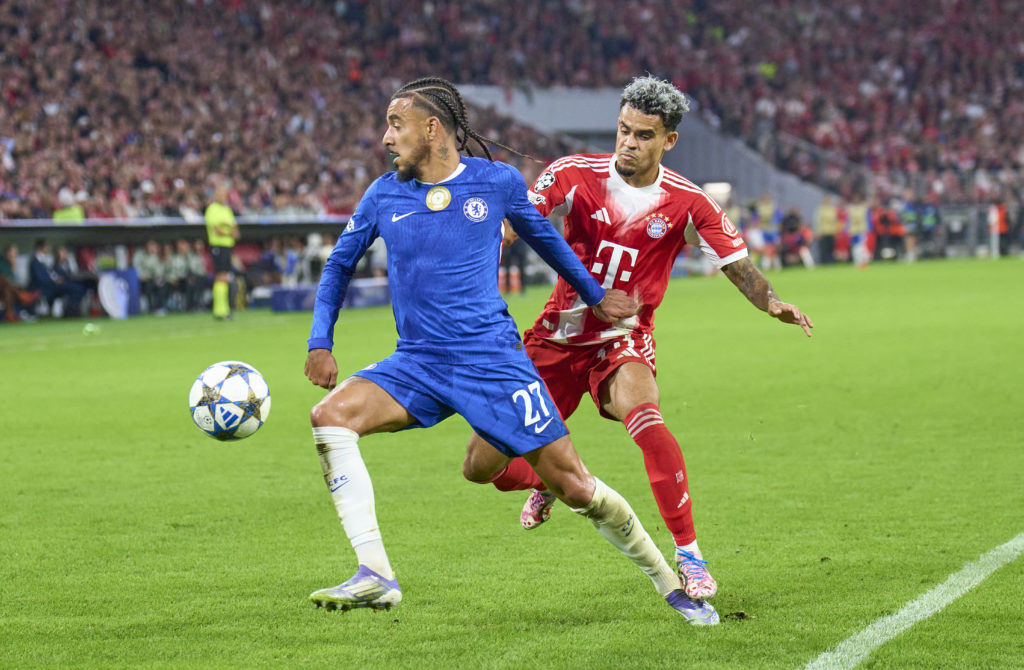 Malo Gusto battling against Luis Diaz during Chelsea's trip to Bayern Munich in the Champions League.