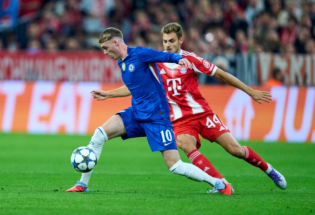 Chelsea star Cole Palmer dribbling against Bayern Munich's Josip Stanisic in the Champions League.