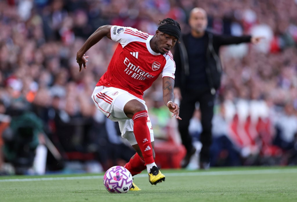 Arsenal winger Noni Madueke dribbling with the ball