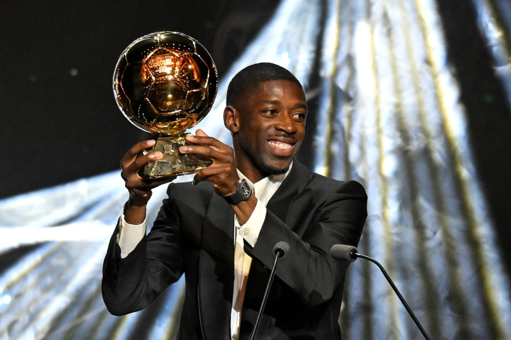 PSG forward Ousmane Dembele holding Ballon d'Or